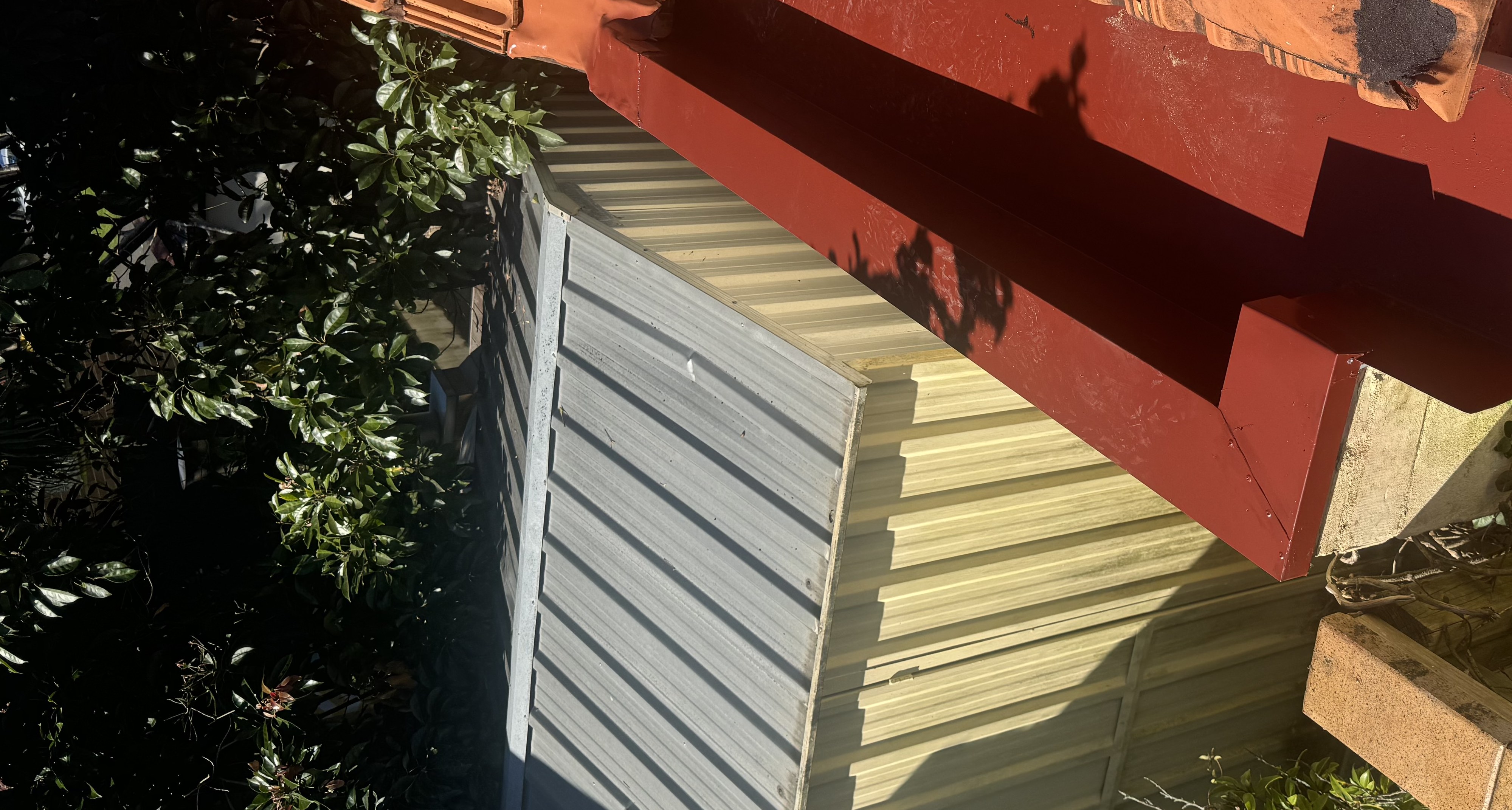 Gutter and flashing detail on a Vulcon job site